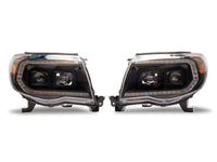 Raxiom 05-11 Toyota Tacoma Axial Series Switchback Projector Headlights- Black Housing- Clear Lens