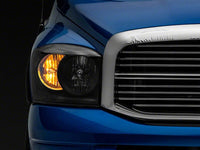 Raxiom 06-08 Dodge RAM 1500 Axial Series Euro Headlights- Black Housing- Clear Lens