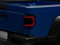Raxiom 20-26 Jeep Gladiator JT Low Profile LED Tail Lights- Black Housing- Smoked Lens