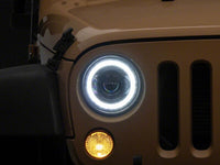 Raxiom 07-18 Jeep Wrangler JK 7-Inch V2 Dragon Eye LED Headlights- Black Housing- Clear Lens