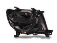 Raxiom 05-11 Toyota Tacoma Axial Series Switchback Projector Headlights- Black Housing- Clear Lens