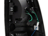 Raxiom 09-18 Dodge RAM 1500 LED Tail Lights- Black Housing- Clear Lens