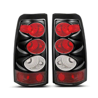 Raxiom 03-06 Chevrolet Silverado 1500 Fleetside Axial Series Tail Lights- Black- Clear Lens