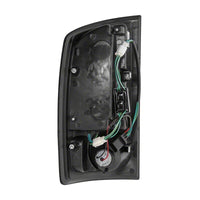 Raxiom 02-05 Dodge RAM 1500 LED Tail Lights- Black Housing- Clear Lens