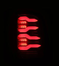 AlphaRex 09-18 Dodge RAM LUXX-Series LED Taillights Black Red w/Actv Light & SS