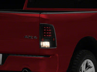 Raxiom 09-18 Dodge RAM 1500 LED Tail Lights- Black Housing- Clear Lens
