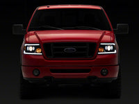 Raxiom 04-08 Ford F-150 Axial Series Projector Headlights with LED Bar- Black Housing- Clear Lens