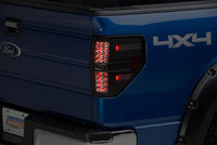 Raxiom 09-14 Ford Styleside Axial Series Black LED Tail Lights