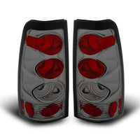 Raxiom 99-02 Chevrolet Silverado 1500 Fleetside Axial Series Tail Lights- Black- Smoked Lens