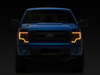 Raxiom 09-14 Ford F-150 CXR Series LED Headlights with Amber DRL- Black Housing- Clear Lens
