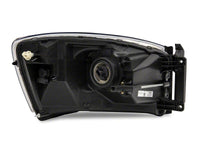 Raxiom 06-08 Dodge RAM 1500 Axial Series Euro Headlights- Black Housing- Clear Lens