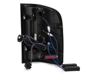 Raxiom 07-13 Chevrolet Silverado 1500 G2 LED Tail Lights- Black Housing- Smoked Lens