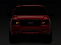 Raxiom 04-08 Ford F-150 Axial Series OEM Style Replacement Headlights- Chrome Housing- Smoked Lens