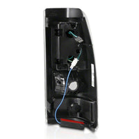 Raxiom 03-06 Chevrolet Silverado 1500 Fleetside Axial Series LED Tail Lights- Black - Clear Lens