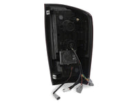 Raxiom 16-23 Toyota Tacoma XW Series Sequential LED Tail Lights- Black Housing- Clear Lens