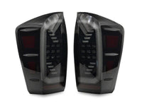 Raxiom 16-23 Toyota Tacoma LED Tail Lights- Black Housing- Clear Lens