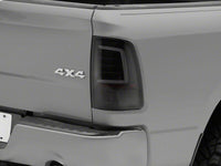 Raxiom 09-18 Dodge RAM 1500 Axial Series LED Tail Lights- Black Housing- Smoked Lens