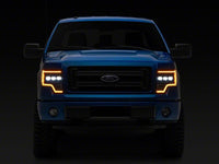 Raxiom 09-14 Ford F-150 CXR Series LED Headlights with Amber DRL- Black Housing- Clear Lens