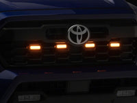 Raxiom 24-26 Toyota Tacoma Pre Runner/TRD Off-Road/TRD Sport Amber LED Grille Light- Smoked Lens