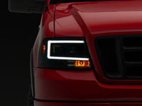 Raxiom 04-08 Ford F-150 Axial Series Projector Headlights- Black Housing- Clear Lens